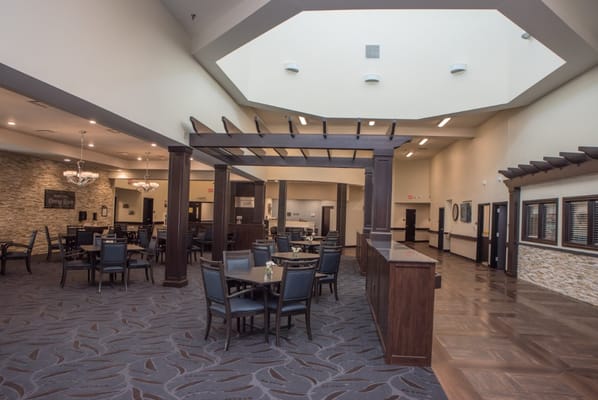 Spacious dining room with tables and chairs at Gateway Springs Health Campus.