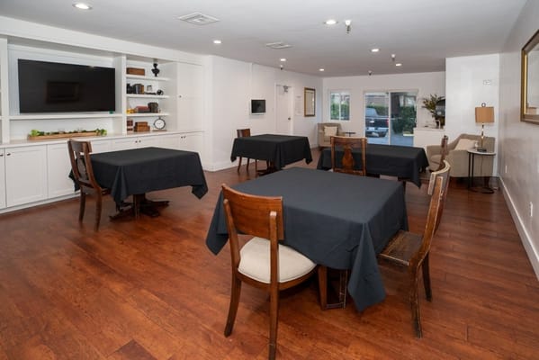 Bright interior dining area with tables and chairs