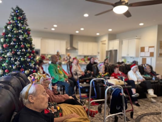 Residents enjoying a holiday activity in a common area