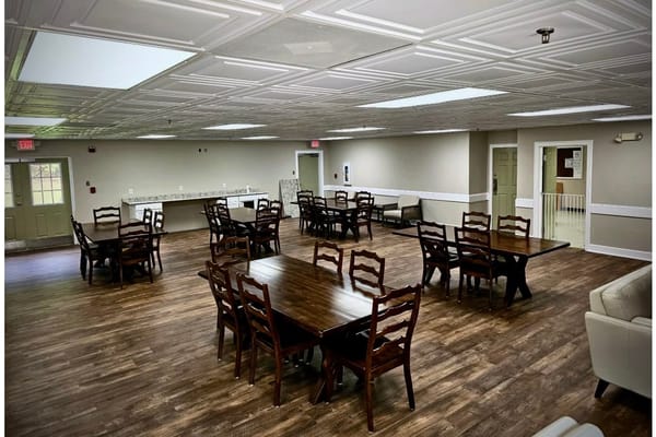 Interior view of a common area with dining tables