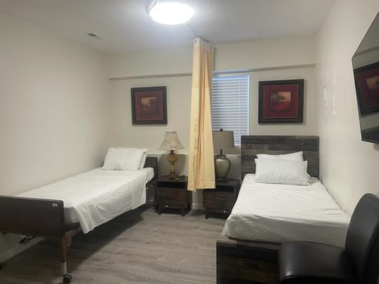 A well-furnished resident bedroom in assisted living