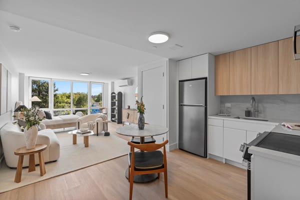 Bright interior of a modern living space with a kitchenette