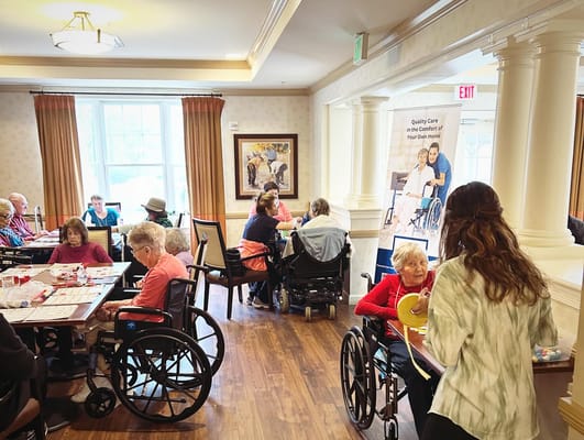 Residents enjoying activities in a communal room.