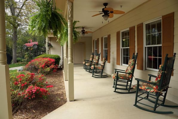 Comfortable rocking chairs on a covered porch