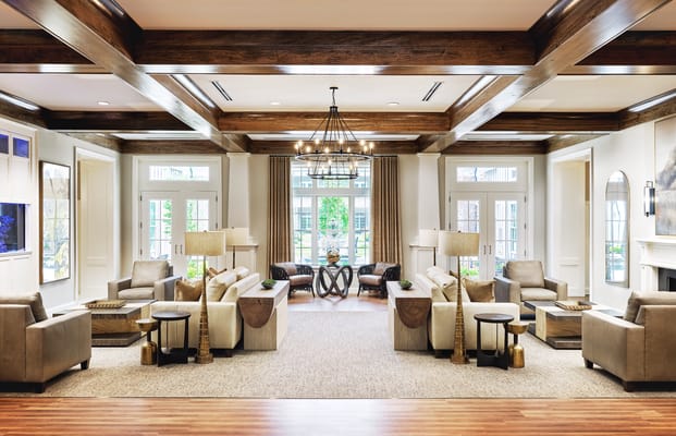 Stylish living room with seating and large windows