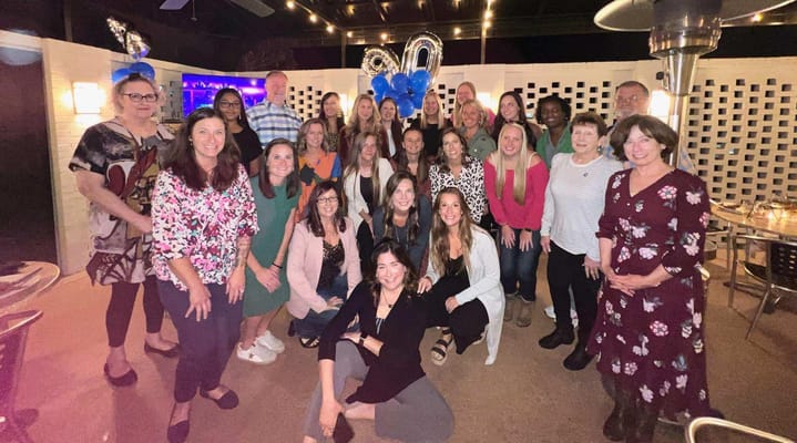 Staff and residents celebrating a milestone together