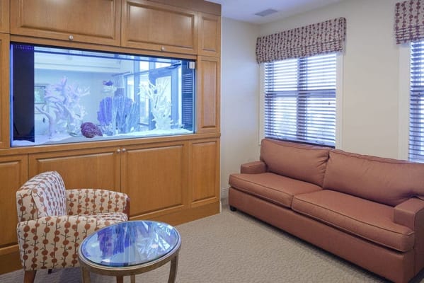 Cozy interior lounge area with aquarium
