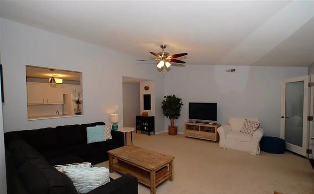 Interior view of a cozy common area with seating