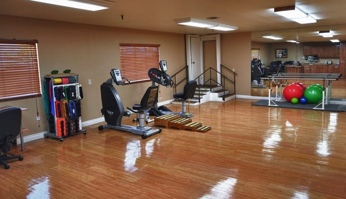 Interior view of a fitness area with exercise equipment