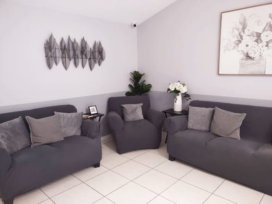 A cozy common area with seating and decor