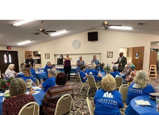 Residents enjoying a meal in a common area