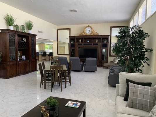 Bright common area with seating and décor