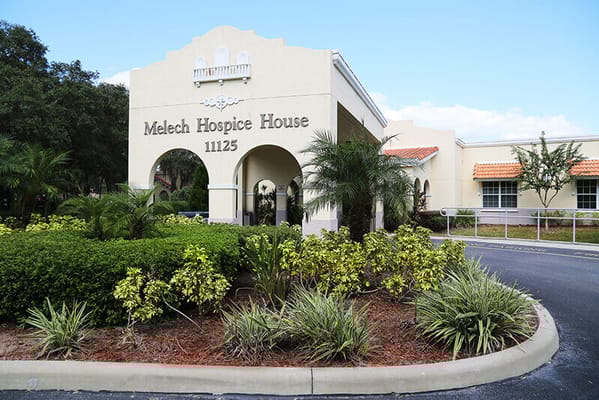 Exterior view of Melech Hospice House with gardens