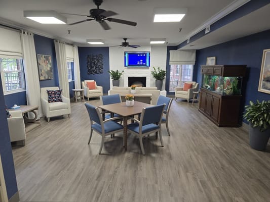 Interior view of a bright common area with seating
