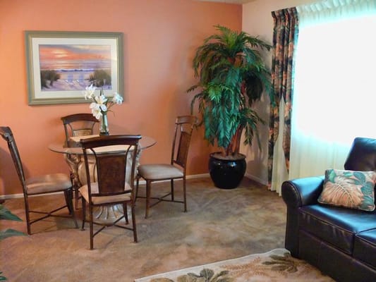 Brightly decorated living area with a dining table