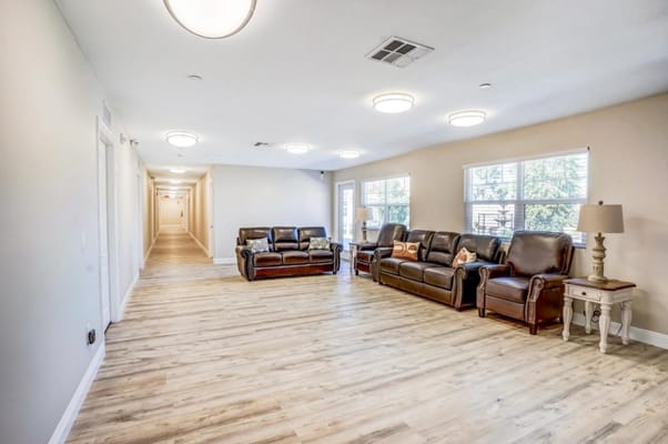 Common area with seating and natural light