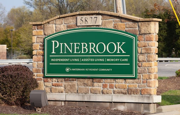 Entrance sign for Pinebrook senior living facility