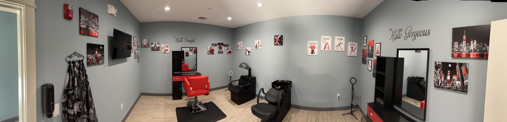 Salon interior with styling stations and decor