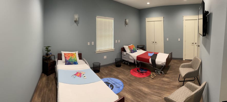 Interior view of a shared resident room with two beds