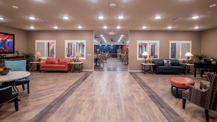 Bright common area with seating and decor