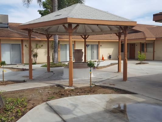 Outdoor gazebo in landscaped courtyard