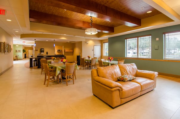 Interior view of a common area with seating and tables