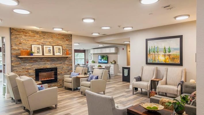 Bright common area with seating and artwork