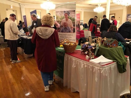 Residents and staff interacting at a community event