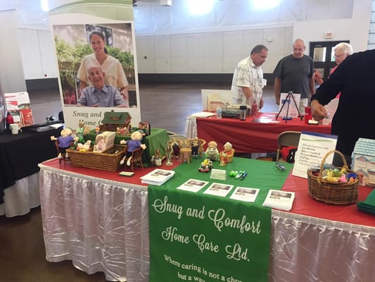 Residents engaging at a facility event with crafts