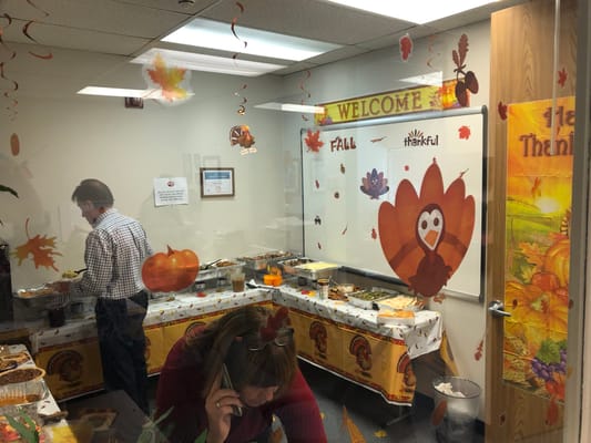 A festive Thanksgiving setup with food and decorations.
