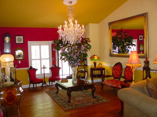 Interior of a lounge area with chandelier and décor
