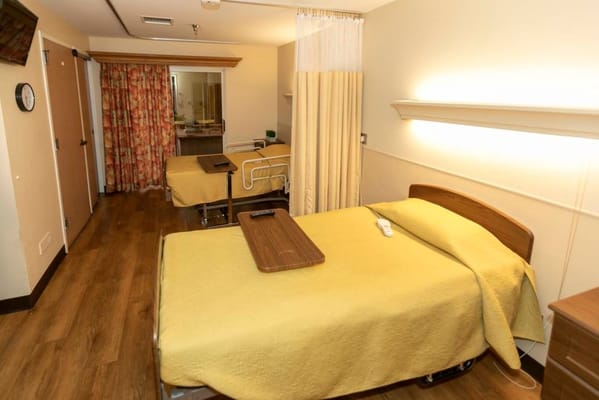 Interior view of a shared resident room with two beds