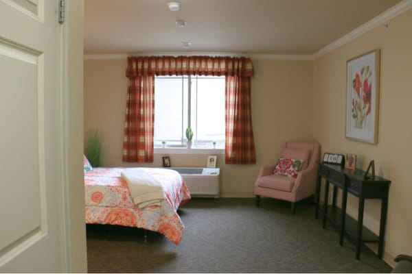 Cozy private resident room with floral decor