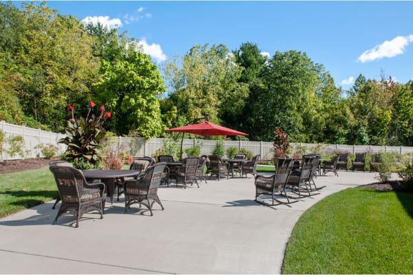 Outdoor patio area with seating and umbrellas