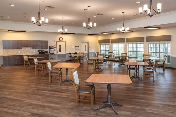 Interior dining area with wooden tables and chairs