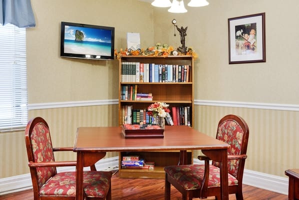 Cozy interior corner with bookshelves and seating