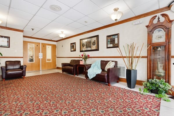 Common area with seating and decorative plants