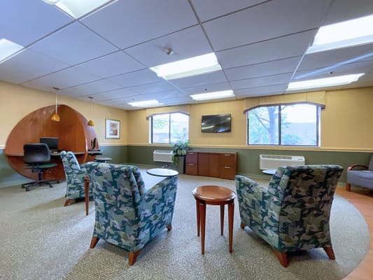 Interior common area with seating and windows