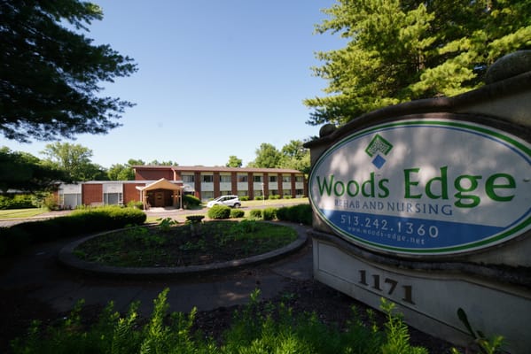 Facility exterior with logo sign visible