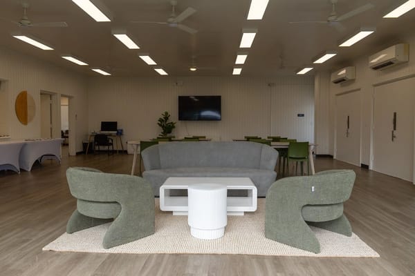 Common area with modern seating and light fixtures