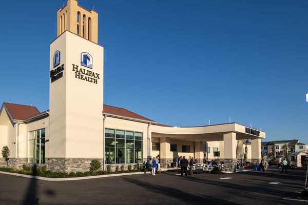 Exterior view of Halifax Health facility with gatherings