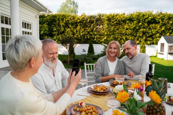 Residents enjoying a meal together in an outdoor space