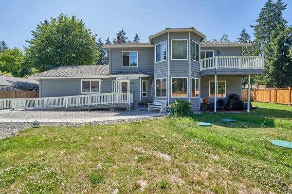 Exterior view of a care home building with outdoor space