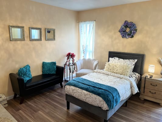 Cozy and inviting resident room with decorative accents