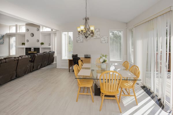 Bright dining area with tables and chairs