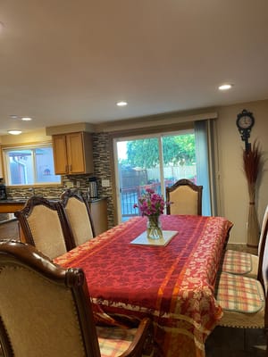 Dining area with a table set for meals