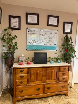 Interior common area with calendar and plants