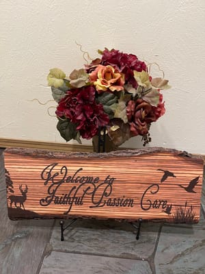 Welcome sign with flowers in a cozy setting