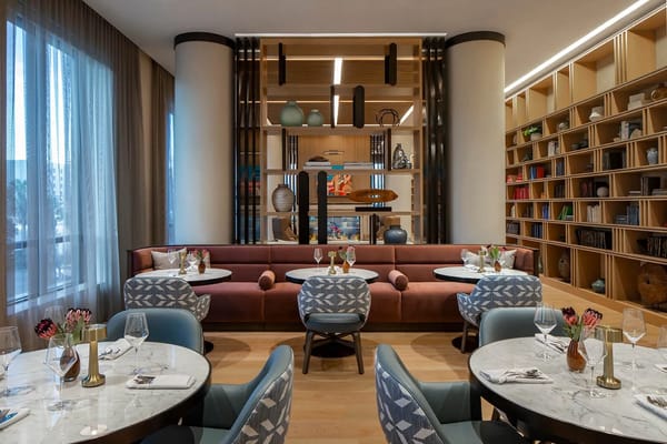 Stylish dining room with modern decor and tables