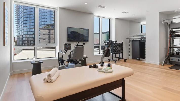 Well-equipped therapy room with exercise equipment